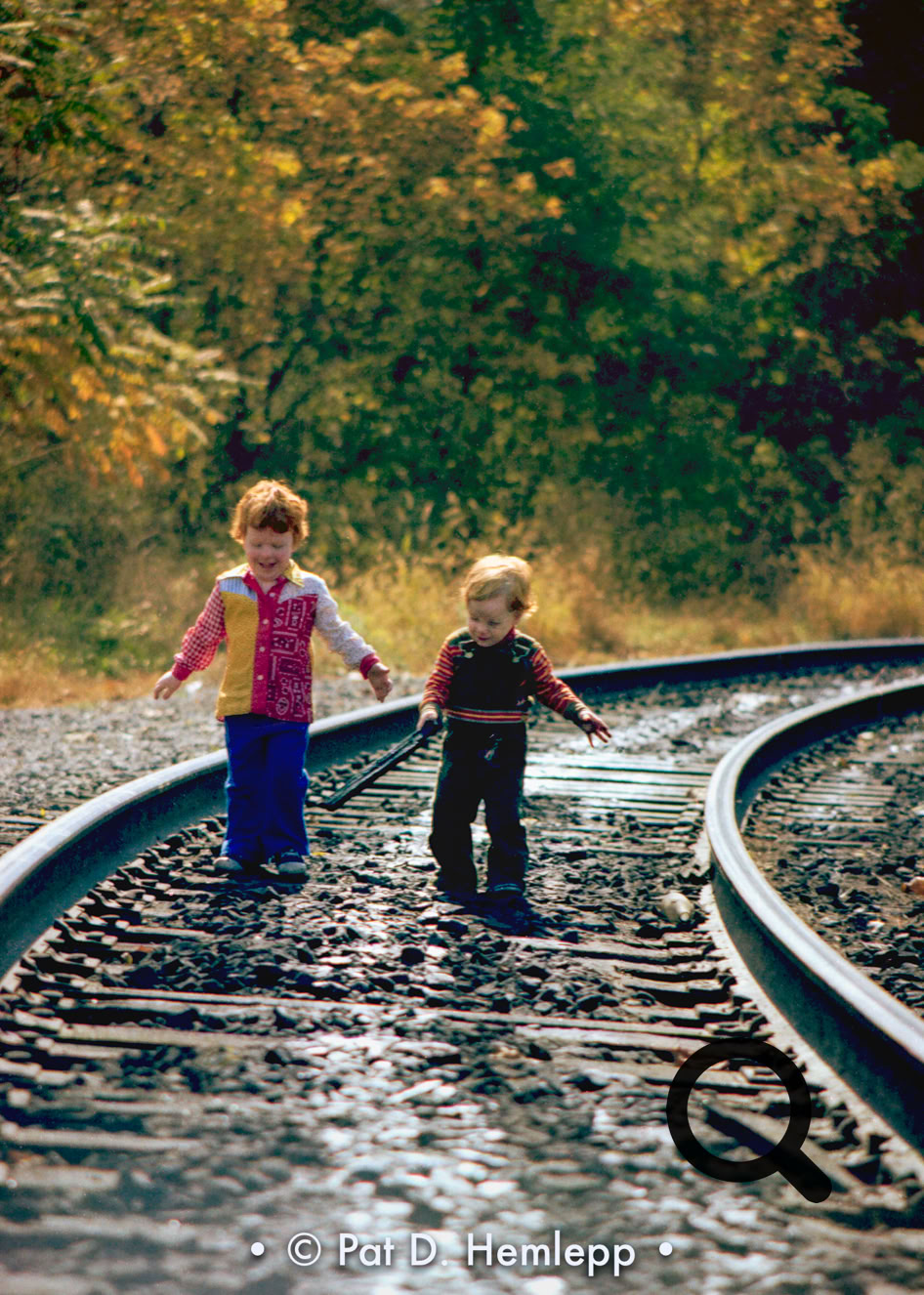 My niece and nephew on railroad tracks near Russell, Ky., October 1978.