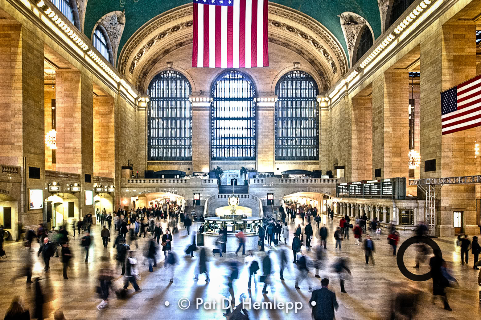 Travelers rush through the Main Concourse of Grand Central Terminal, New York City.