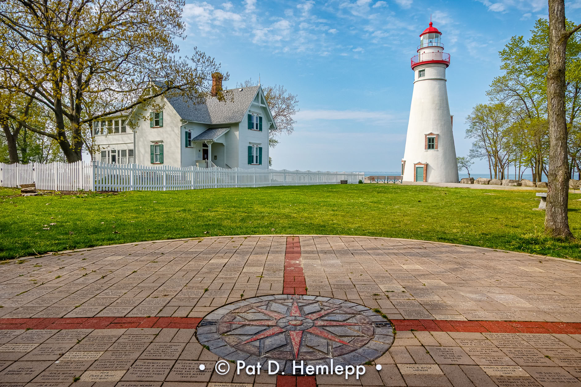 A compass shows directions on the grounds of the Marblehead Lighthouse in Marblehead, Ohio. 