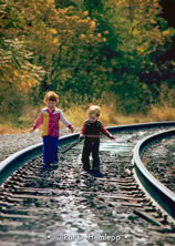 My niece and nephew on railroad tracks near Russell, Ky., October 1978.